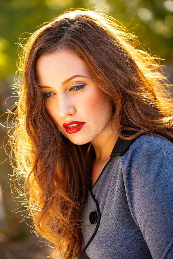 files/back-lit-outdoor-portrait-beautiful-young-woman-close-up-smiling-her-long-brown-hair-late-afternoon-sunlight-327679684.webp